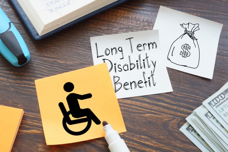 Long term disability benefits sticky notes concept image